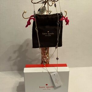 Kate Spade opening night Gold Chain with Purple and blue stone Details